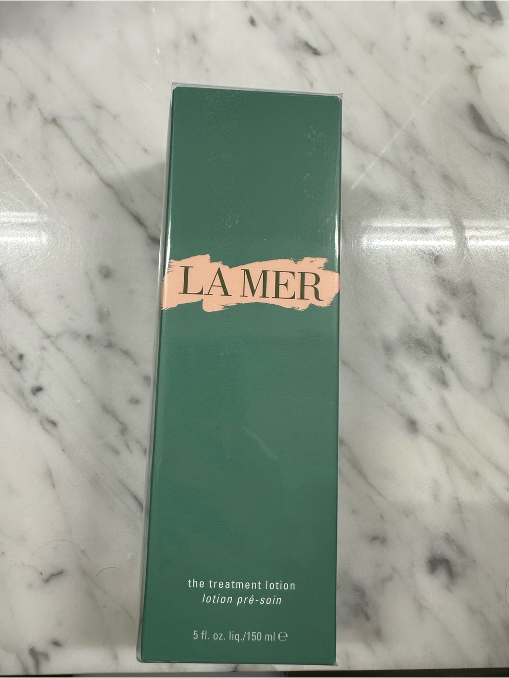 La Mer Hydrating Treatment Lotion — Green Box with Peach Accent